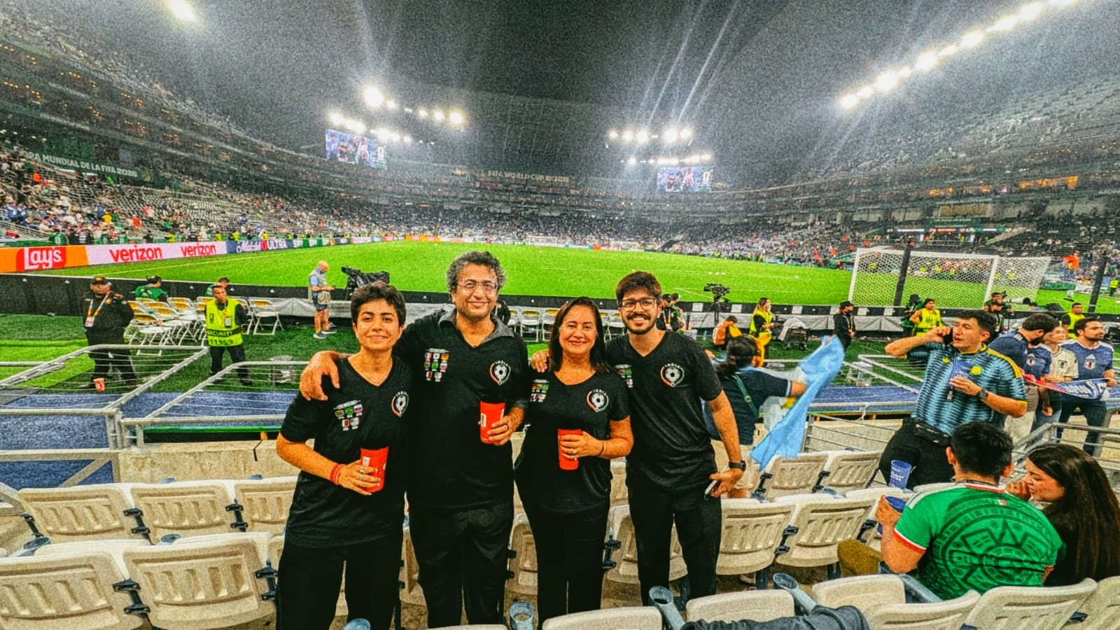 The Nagpal family in matching shirts inside the stadium at the 2026 FIFA World Cup